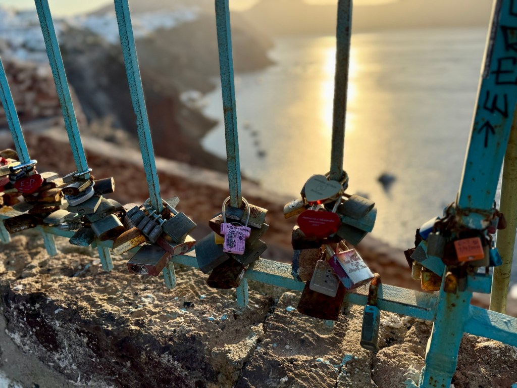 Where Love Hangs in the Wind: Discovering the Hidden Lock Fence of&nbsp;Oia
